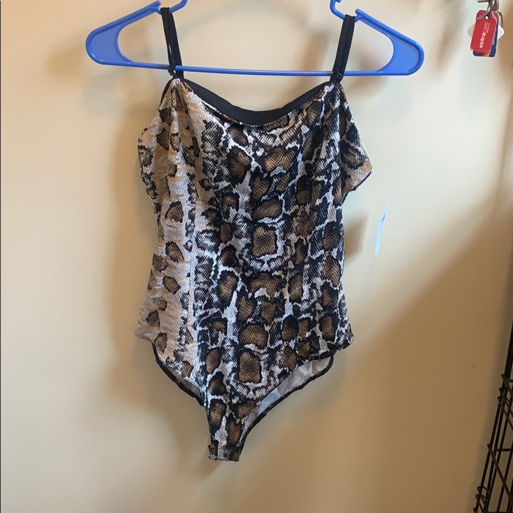 Cheetah print body suit. NWT